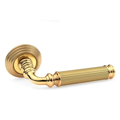 Ручка дверная на круглой розетке Frosio Bortolo коллекция Fadex (Фадекс) Rania 246P (Piramid) L03 - латунь полированная/ латунь матовая