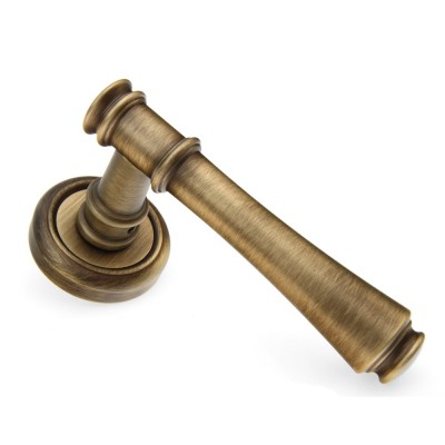 Ручка дверна на круглій розетці Frosio Bortolo колекція Fadex (Фадекс) Tako 245V B02 - бронза матова